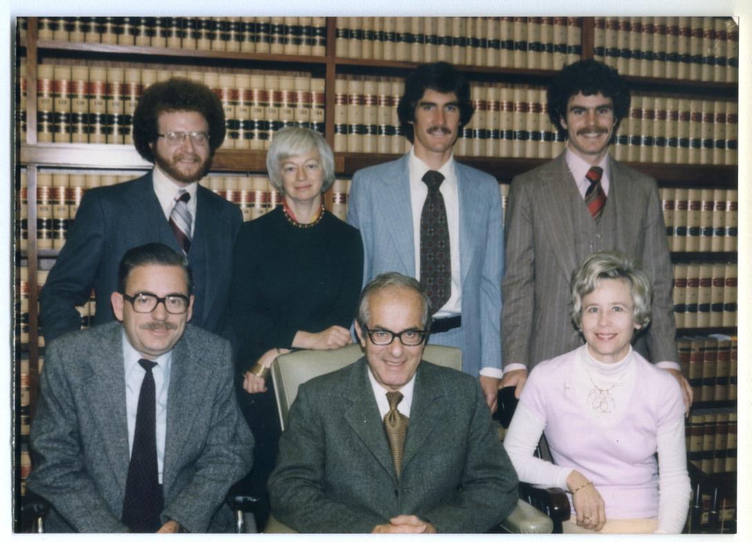 NYF Founder Olga Murray during her law career, posing with California Supreme Court Justice Mosk and his staff.