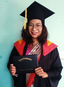 Bishnu Chaudhary graduates from law school. She is the first from the Freed Kamlari community to pass Nepal's bar exam.