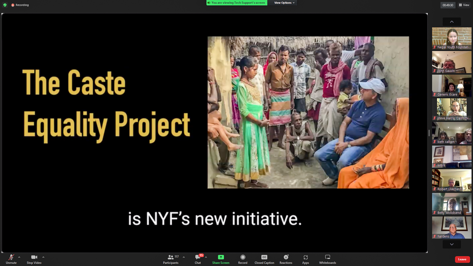 A Zoom screenshot of a presentation highlight. The text says "The Caste Equality Project is NYF's new initiative" and the main photo is of a community of Musahar Dalits in eastern Nepal speaking to NYF president Som Paneru while he listens intently. A thin bar of 9 random Founder's Day attendees are visible at the right of the image.