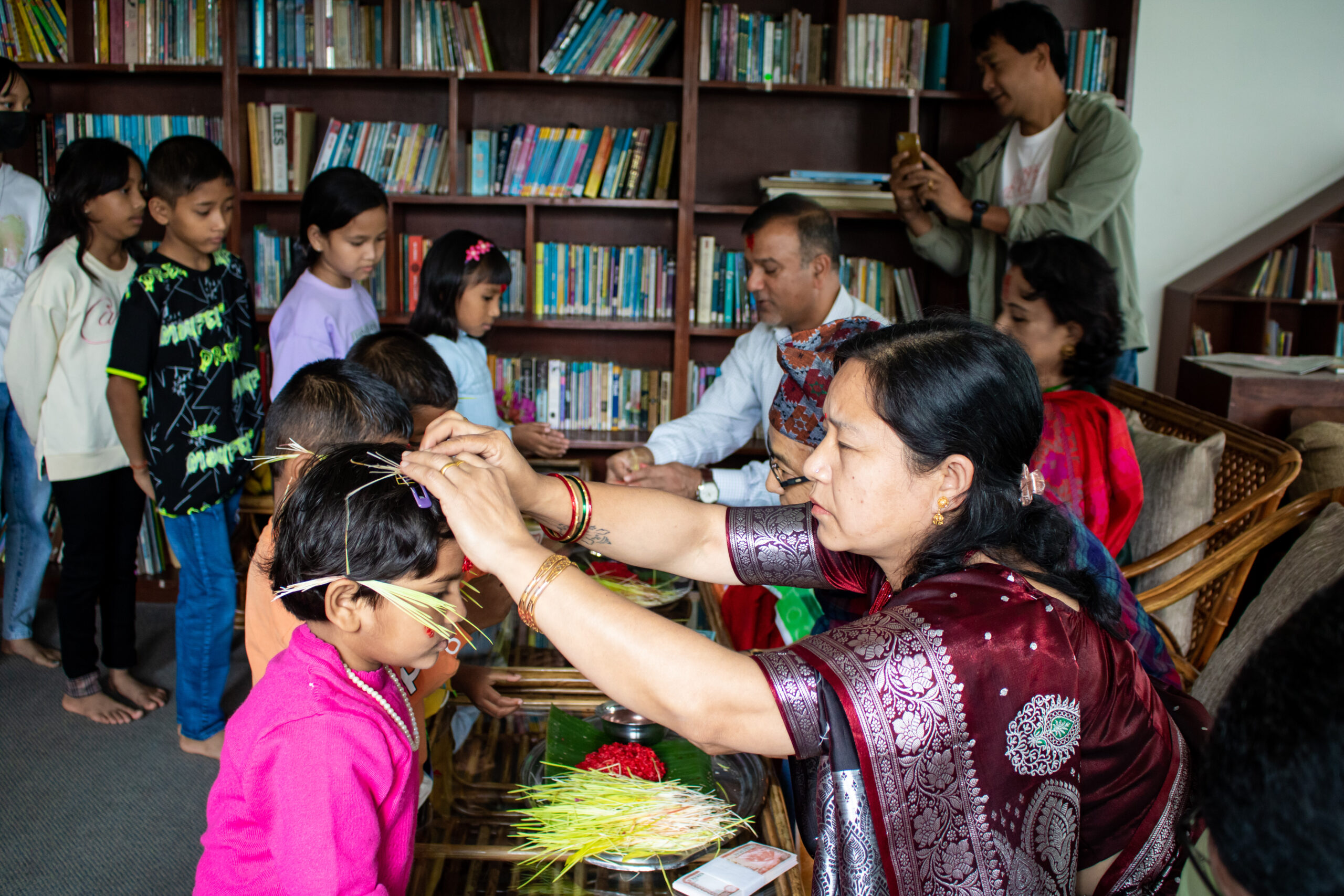 A junior girl receives tika blessings at this year's Dashain festival. In Nepal, this time is all about honoring and strengthening important, loving, constructive relationships. That’s why we think this is the perfect moment to welcome our new U.S. Executive Director, Ryan Walls!