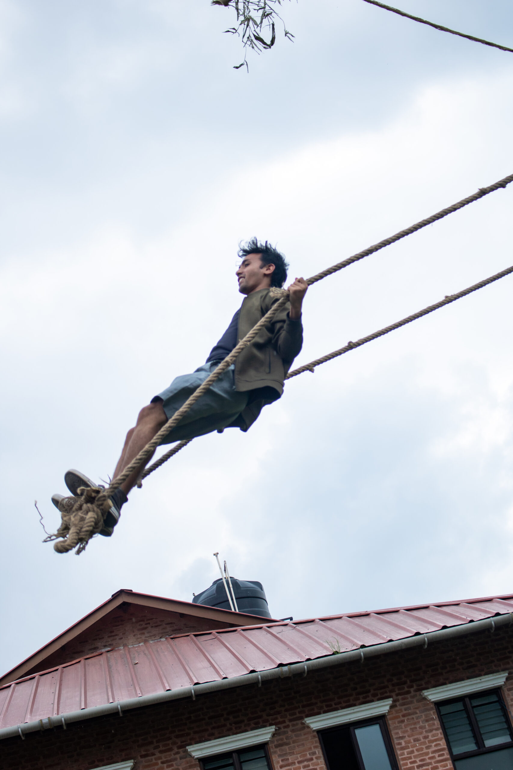 A senior boy at Olgapuri swings on the linge ping. 